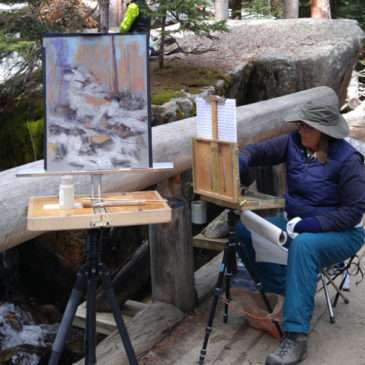 Andrea Gabel and Margueritte Meyer painting at Cascade Falls in Rocky Mountain National Park